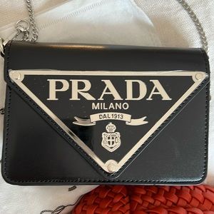 Stamped,  Prada Milano 1913 Crossbody or clutch never been used!